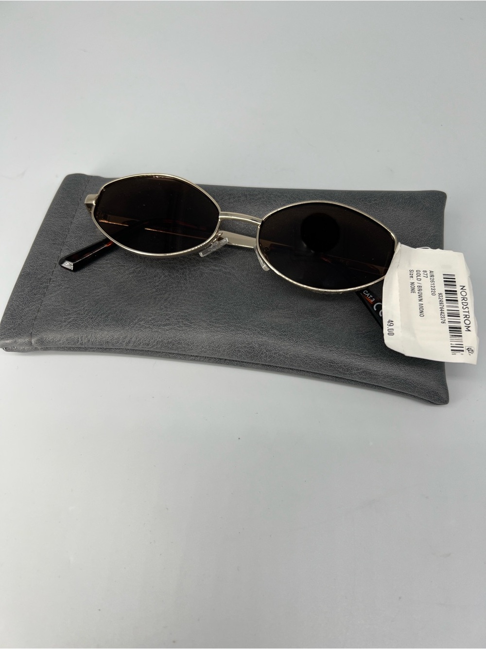 Aire women’s Round Metal Frame Sunglasses in Black